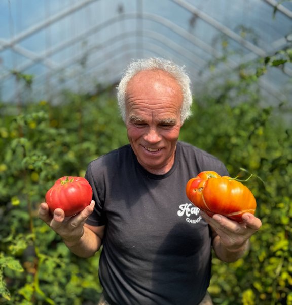 Farmer with cattle in winter